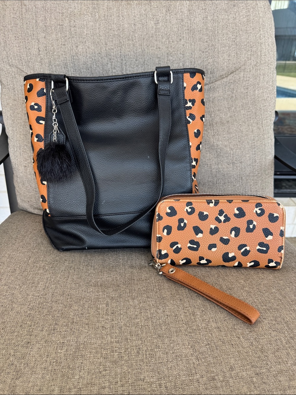 Thirty one Black Tote with Tan Leopard Panels and Matching Wristlet.